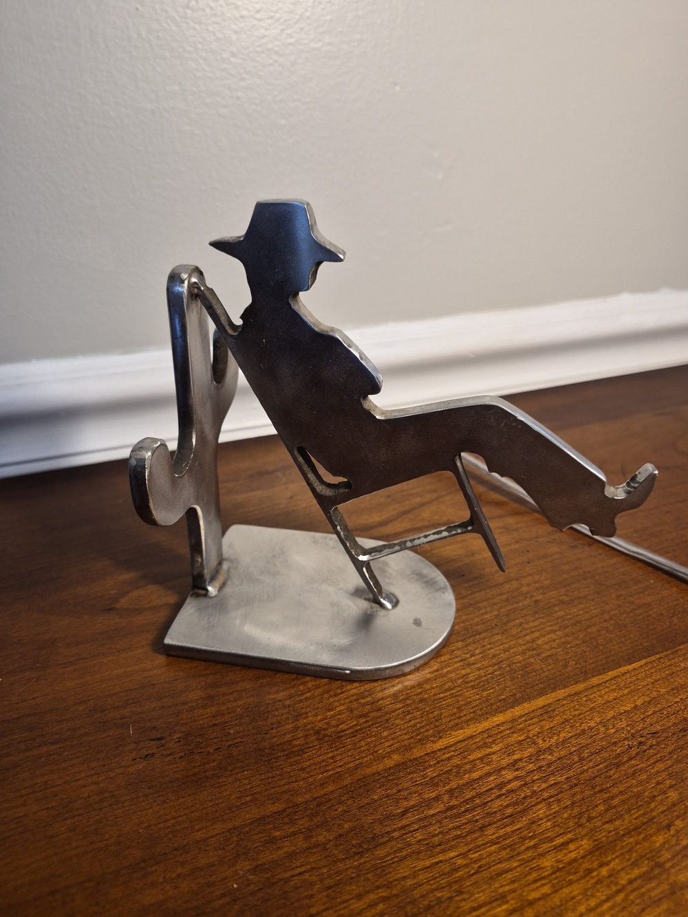 Stainless Steel Metal Cowboy Sitting In Chair Against Cactus, Door Stop/Bookend